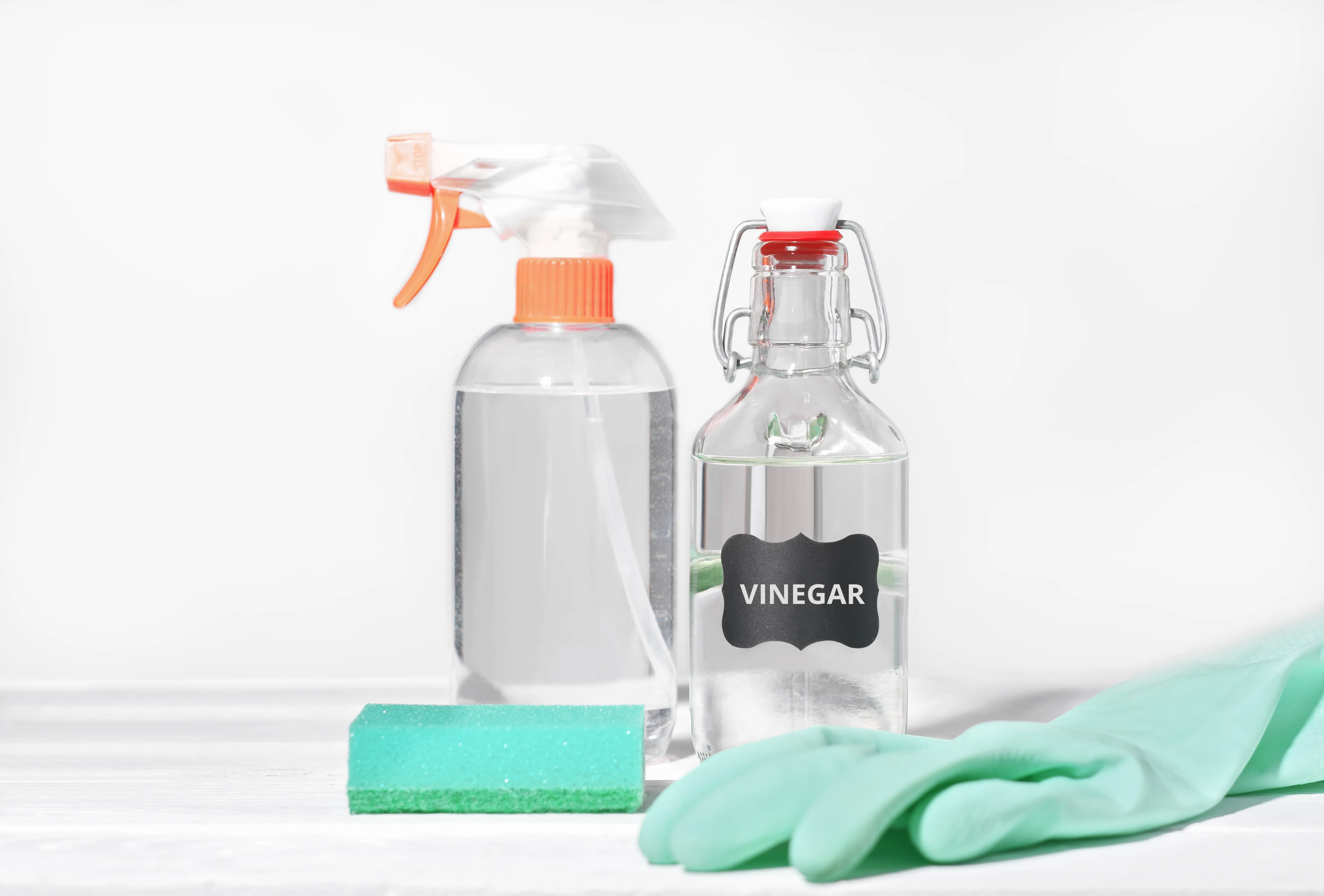 White vinegar and cleaning supplies — hard water solutions for eco laundry
