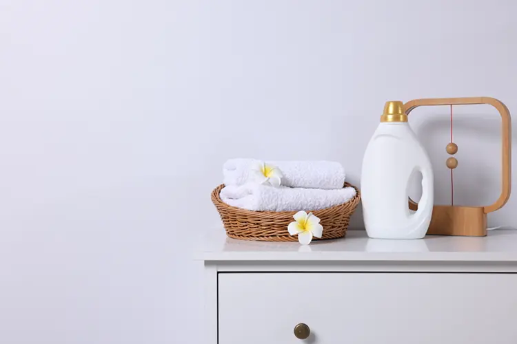 Fresh white towels and gentle laundry detergent for sensitive skin