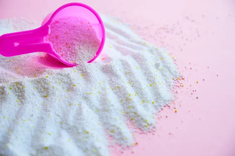 Pink scoop measuring organic laundry powder